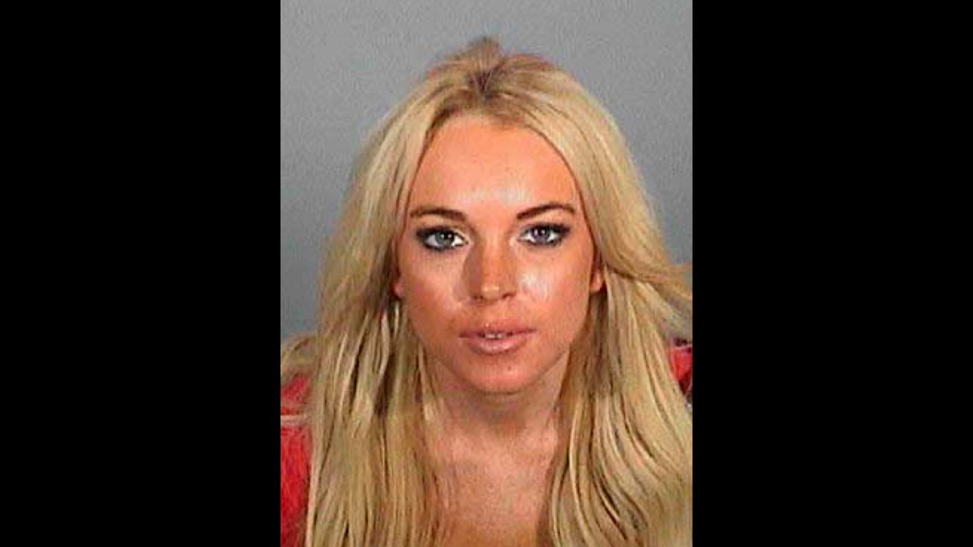 Lohan poses for a booking photo after being arrested on DUI charges at Lynwood Jail in November 2007. Lohan voluntarily reported to the facility to serve her minimum 24-hour jail sentence that was part of a plea bargain for two DUI charges.