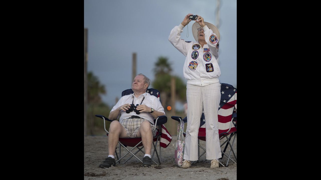 Jorgen and Ruth Sabinsky watch the flyover of Endeavour in Cocoa Beach, Florida, on Wednesday.