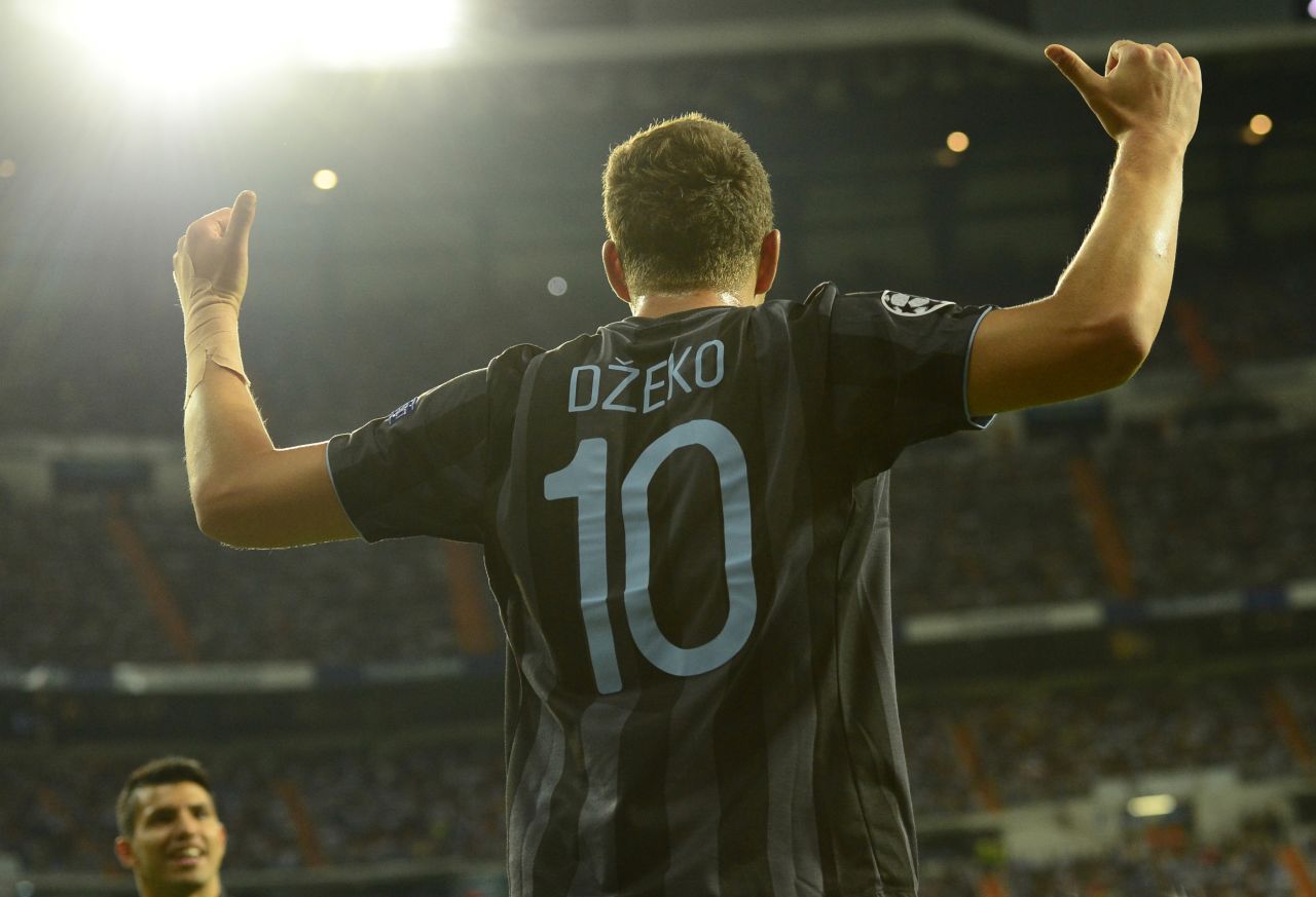 Edin Dzeko came off the bench to give Manchester City the lead against Real Madrid in their European Champions League encounter in the Spanish capital.