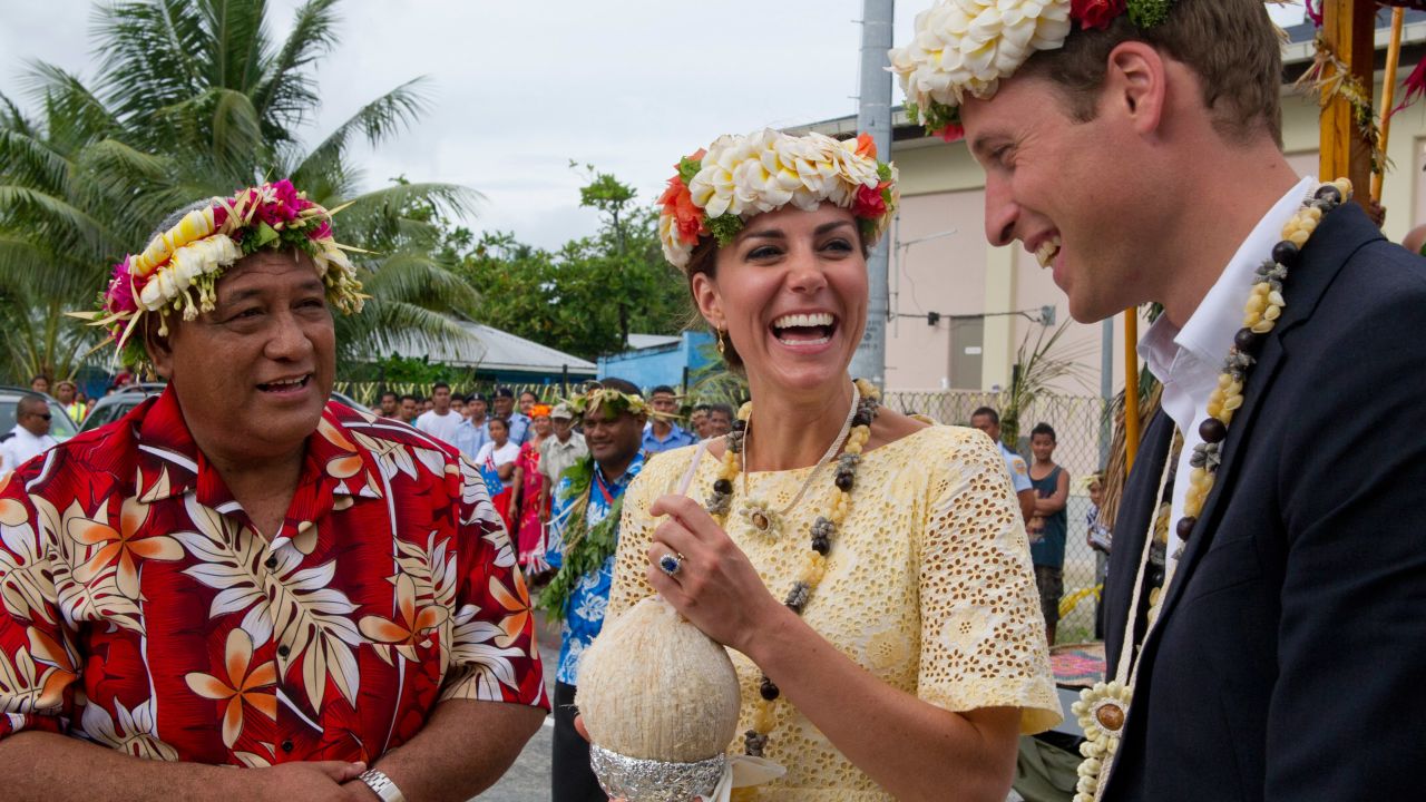 William and Kate drink coconut milk from a tree planted by the Queen in 1982 on September 18, 2012 in Tuvalu.