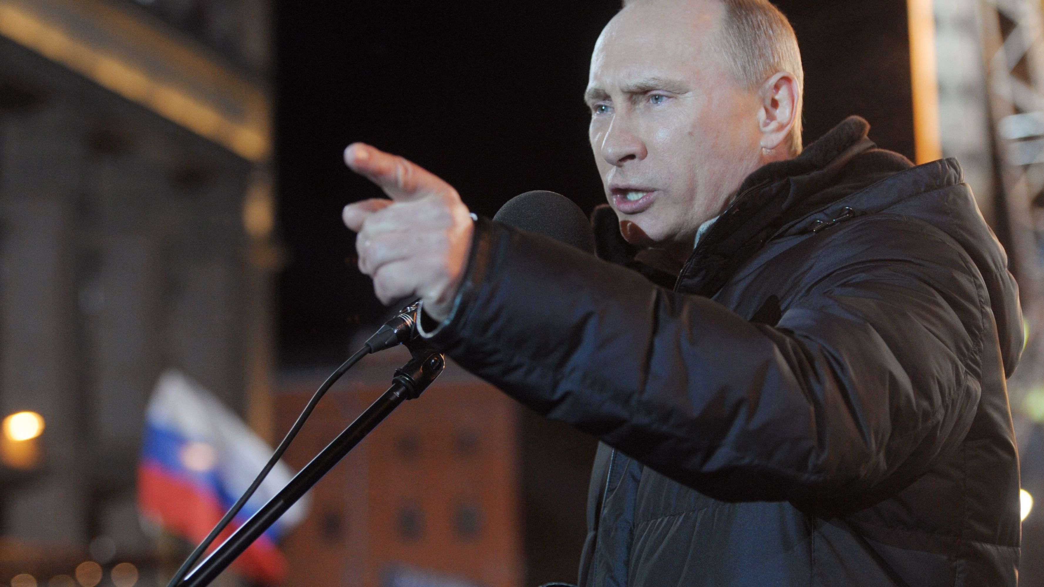 Russia's President Vladimir Putin addresses supporters in Manezhnaya Square on election night, March 4, 2012. 