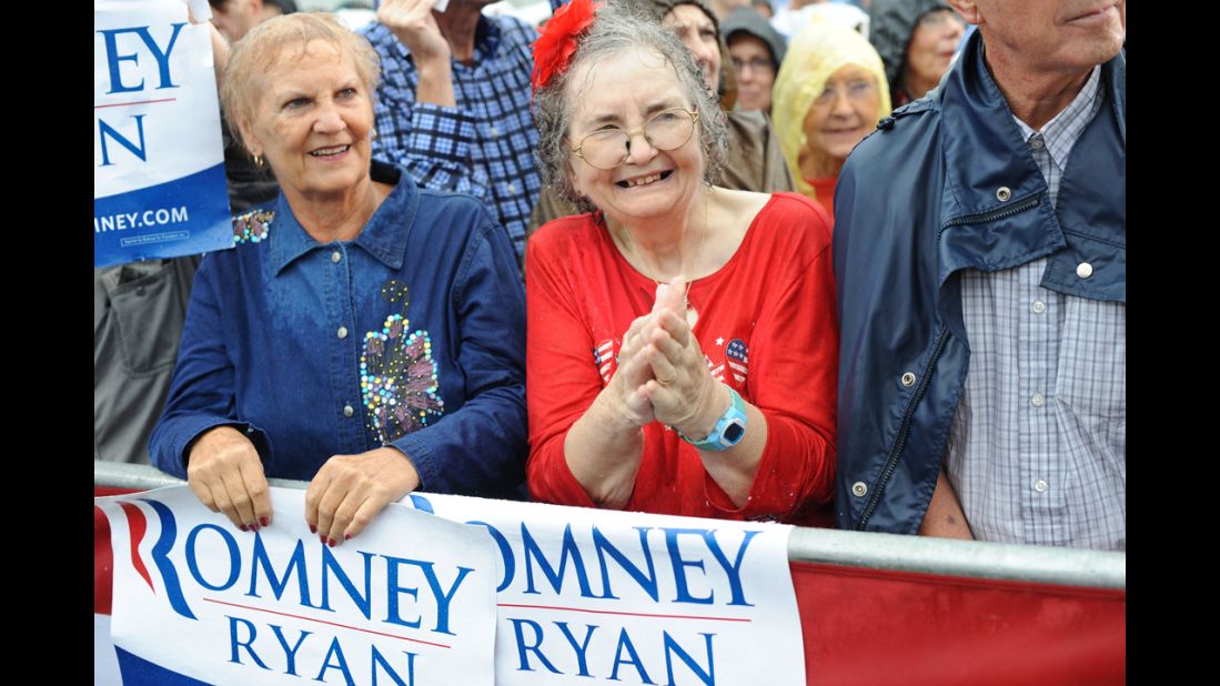 Supporters wait for Romney to speak at a campaign rally at Lake Erie College in Painesville, Ohio, on Friday.