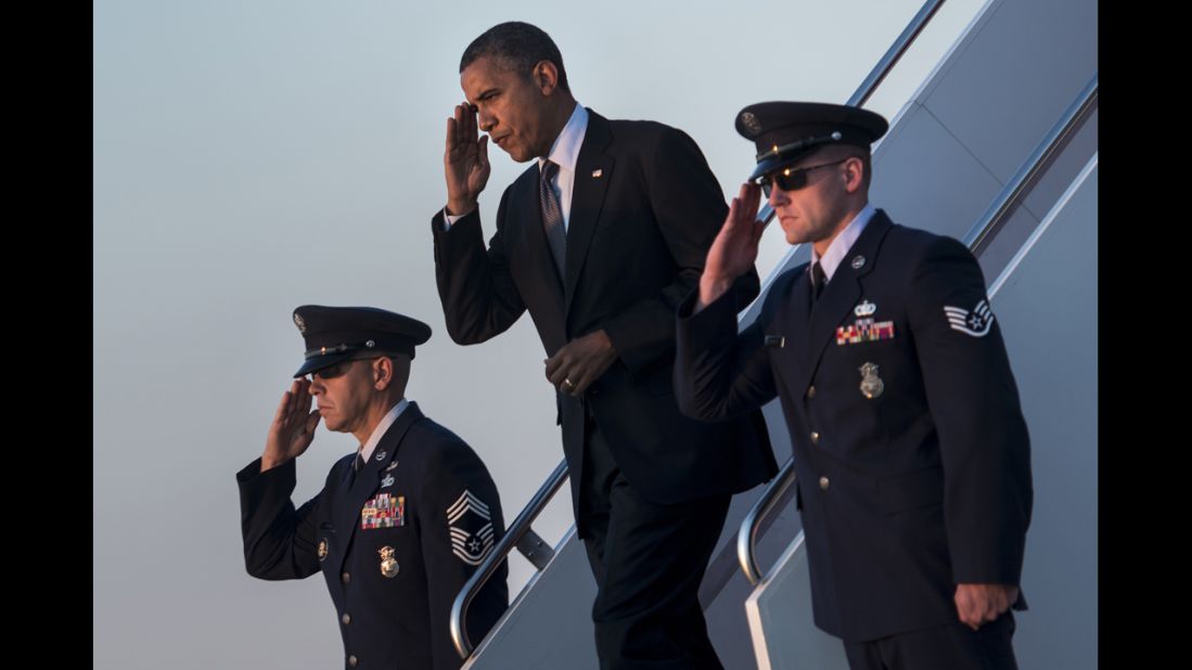 President Barack Obama arrives at Andrews Air Force Base in Maryland on Thursday, September 13.  Obama returned to Washington after a two-day campaign trip with events in Nevada and Colorado. <a href="http://www.cnn.com/SPECIALS/world/photography/index.html" target="_blank">See more of CNN's best photography</a>.