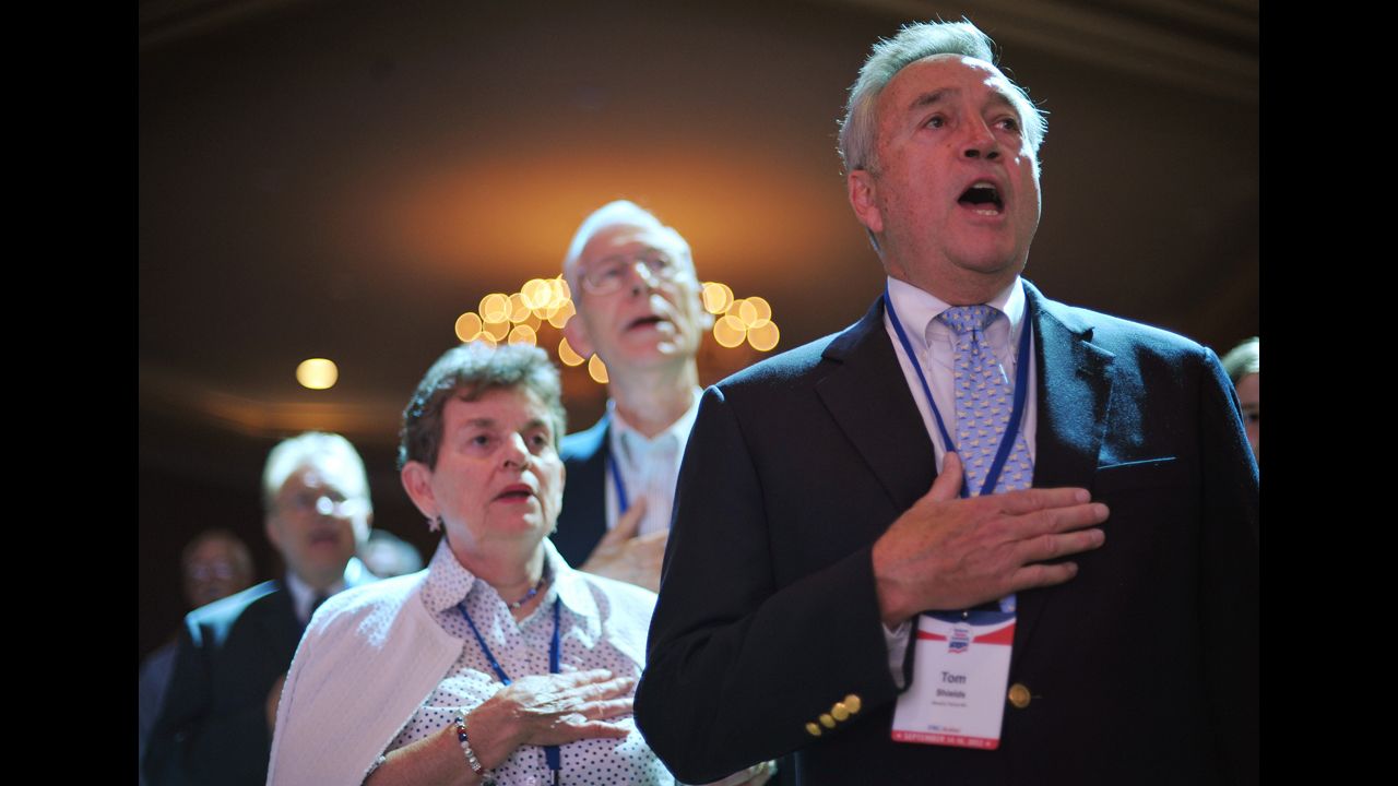 Attendees sing the National Anthem during The Family Research Council  Action Values Voter Summit on Friday in Washington. The summit is an annual political conference for U.S. social conservative activists and elected officials.