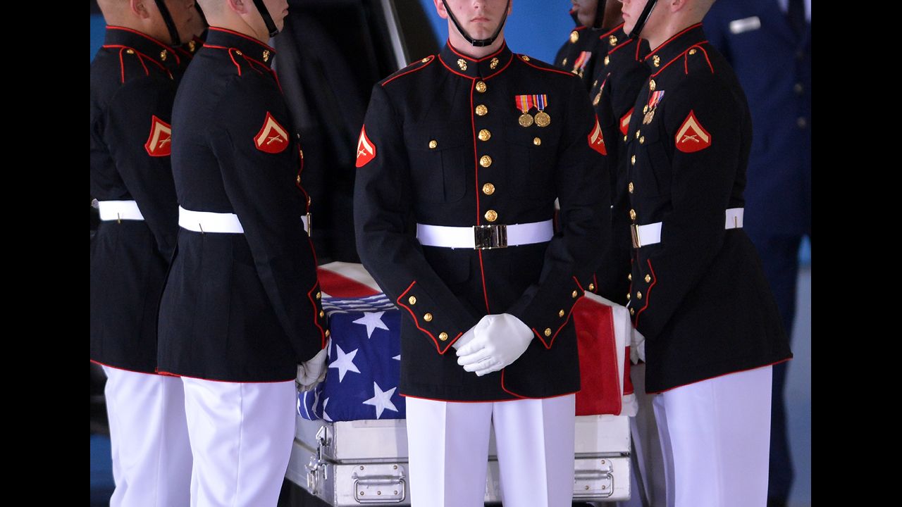 U.S. Marines stand around a casket during the transfer of remains ceremony marking the return to the United States of the remains of the four Americans killed in an attack this week in Benghazi, Libya, at Andrews Air Force Base in Maryland on Friday. U.S. Ambassador Christopher Stevens died along with three other Americans in the assault on the consular building in Benghazi on September 11.
