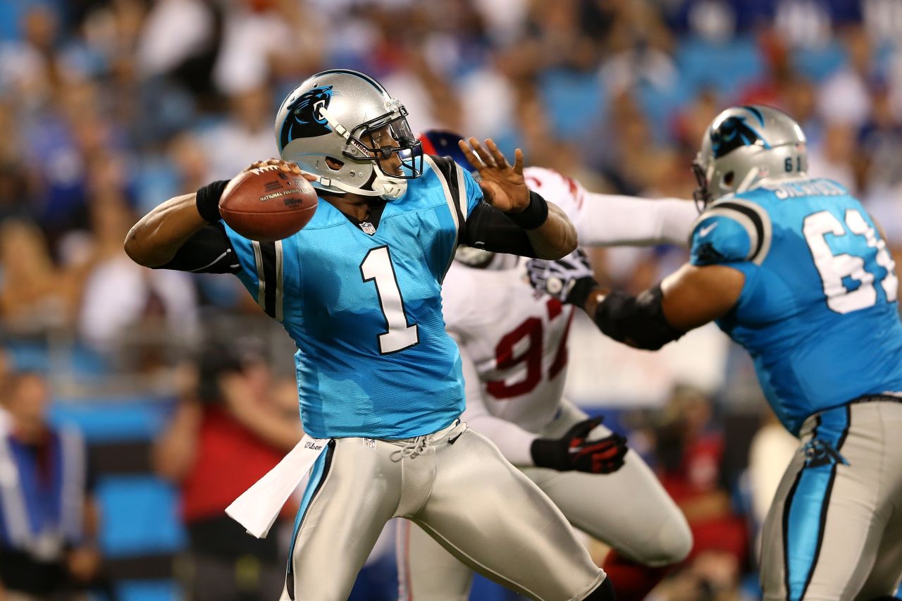 Panthers quarterback Cam Newton throws a pass in the first quarter against the New York Giants on Thursday.