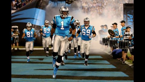 Quarterback Cam Newton of the Carolina Panthers leads his teammates onto the field to play against the New York Giants on Thursday. <a href="http://www.cnn.com/2012/09/13/football/gallery/nfl-week-2/index.html" target="_blank"><strong>Look back at the best of Week 2</strong></a> and at <a href="http://www.cnn.com/SPECIALS/world/photography/index.html" target="_blank"><strong>see more of CNN's best photography</strong></a>.