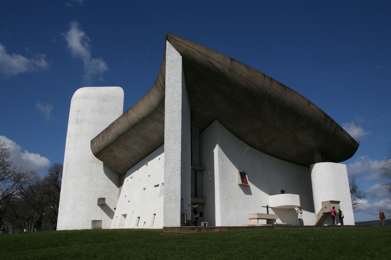 The building Hughes most wishes he had built is Le Corbusier's Notre Dame du Haut chapel in Ronchamp, France.