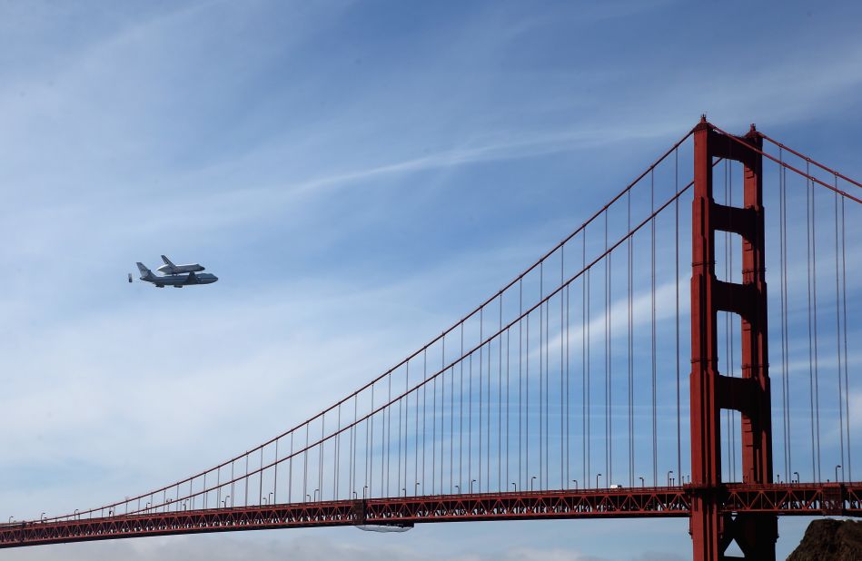 Space shuttle Endeavour passes over the Golden Gate Bridge before making its final landing in Los Angeles on Friday, September 21. The shuttle passed over California landmarks before heading to the airport. Endeavour will be placed on public display at the California Science Center. This is the final ferry flight scheduled in the Space Shuttle Program era. <a href="http://www.cnn.com/SPECIALS/world/photography/index.html" target="_blank">See more of CNN's best photography</a>.