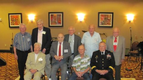 Eight of the remaining members of the 63rd Infantry Division, which fought through France and Germany in World War II, at a recent reunion in Ohio. Maj. Gen. Michael Schweiger, commander 63rd Regional Support Command also attended.