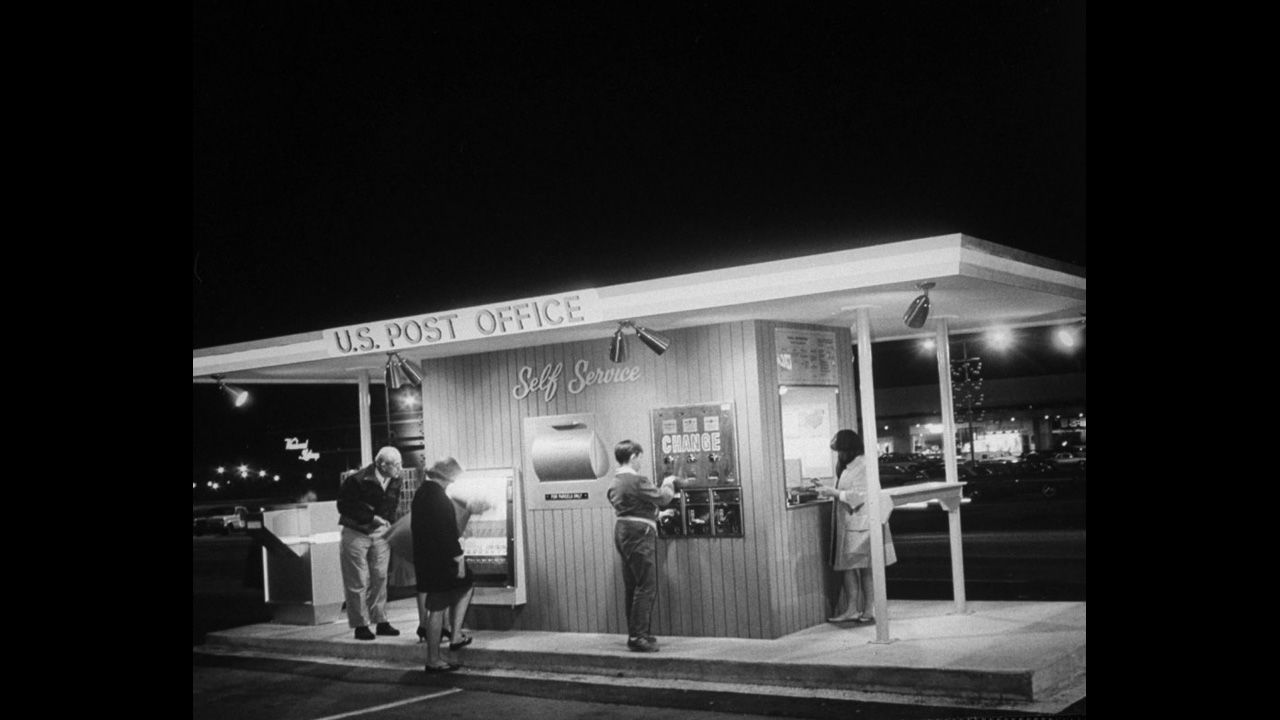 A 24-hour automated post office in Maryland provides self-service in 1964.