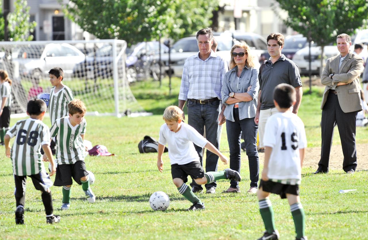 From left to right: Romney, his wife Ann, and son Tagg watch one of Tagg's sons play soccer in Belmont, Massachusetts, on Saturday, September 15.
