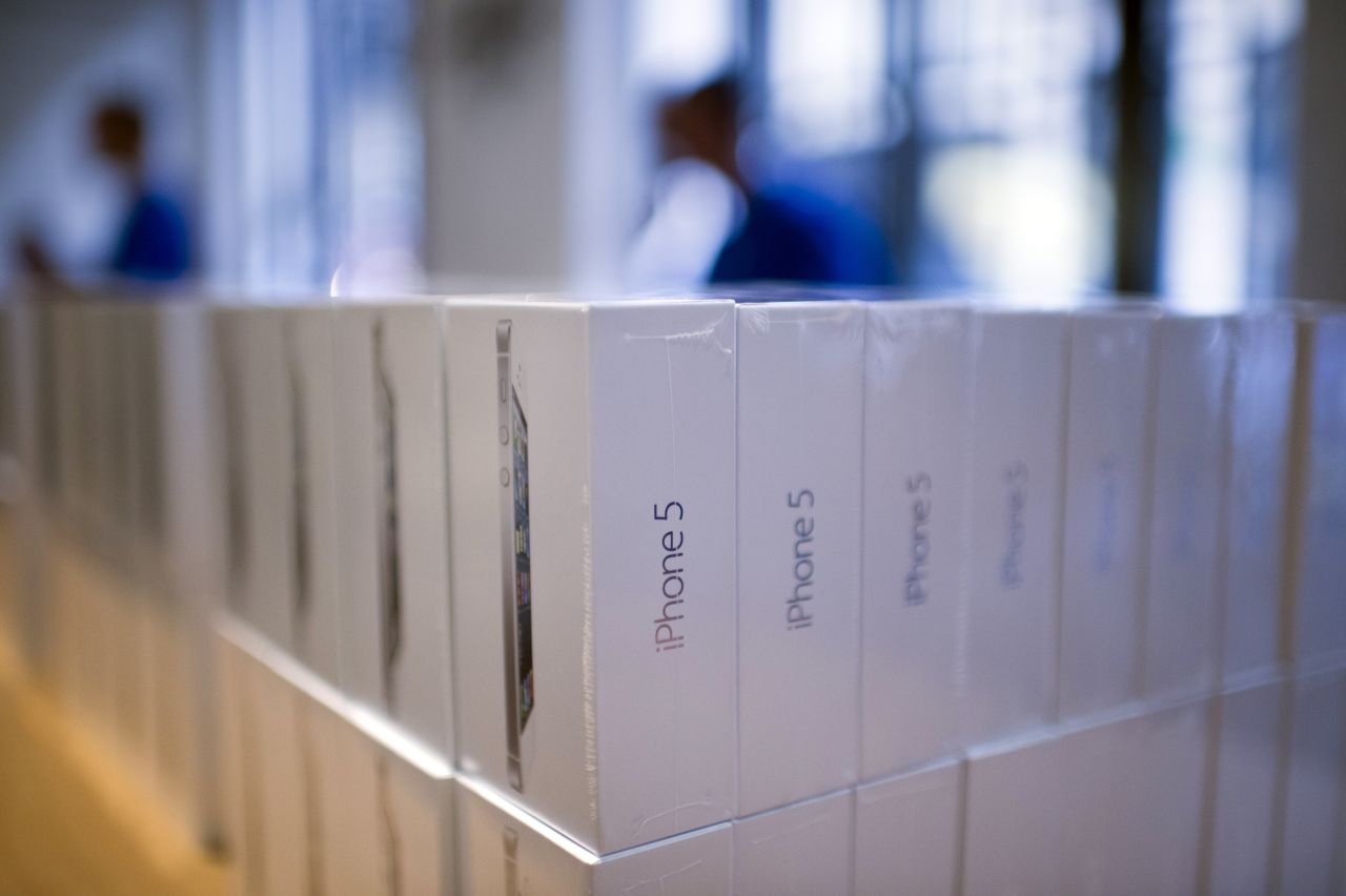 Piles of Apple's new iPhone 5 sit in boxes in an Apple store in Paris.
