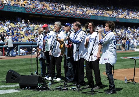 The group poses for a photo before they perform the national anthem on Opening Day at Dodger Stadium as the Los Angeles Dodgers take on the Pittsburgh Pirates in April 2012 in Los Angeles. The Beach Boys are celebrating their 50th anniversary, along with Dodger Stadium. 