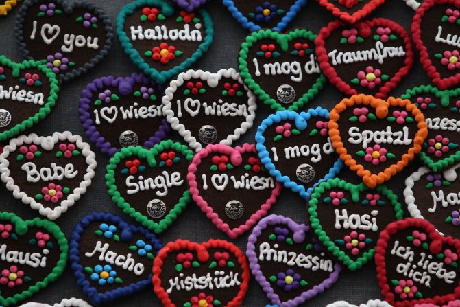 Typical Oktoberfest heart badges are seen at a beer tent.