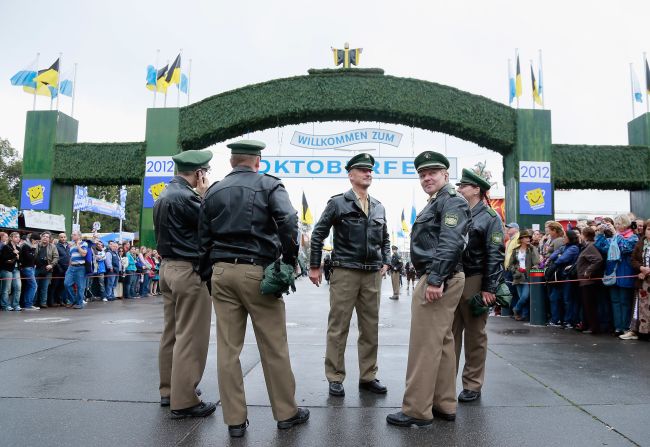 Police officers wait for the opening parade to begin.