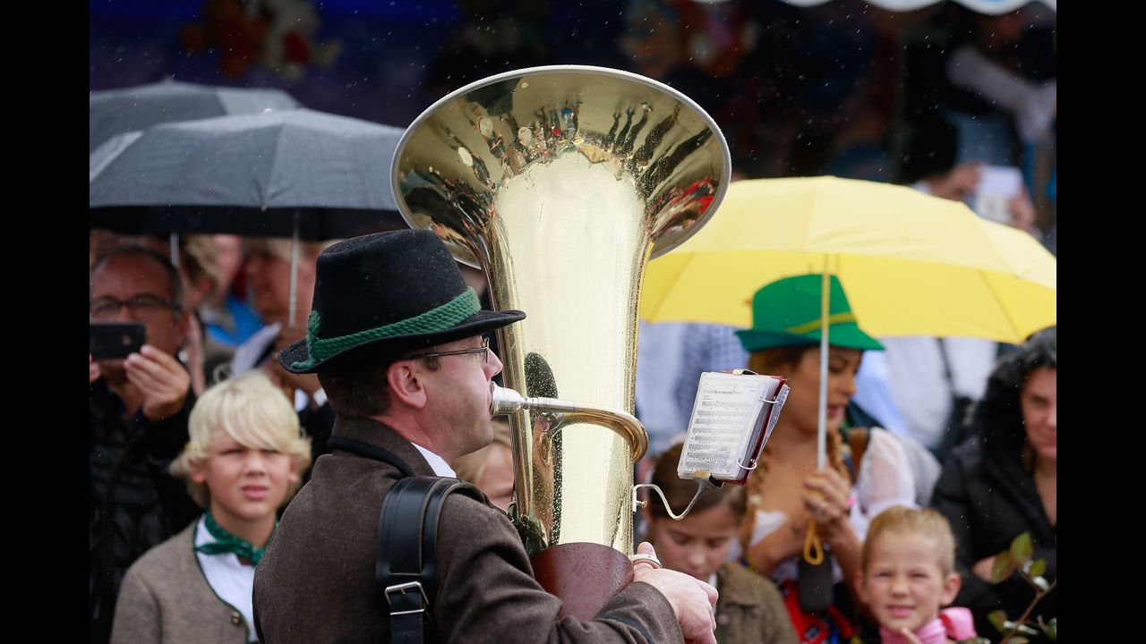 A tuba player performs as a parade kicks off the festival.