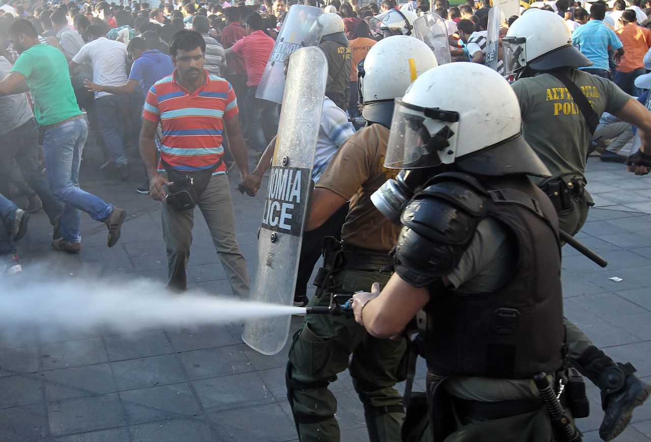 Riot police clash with demonstrators in Athens, Greece, on Sunday, September 23. 