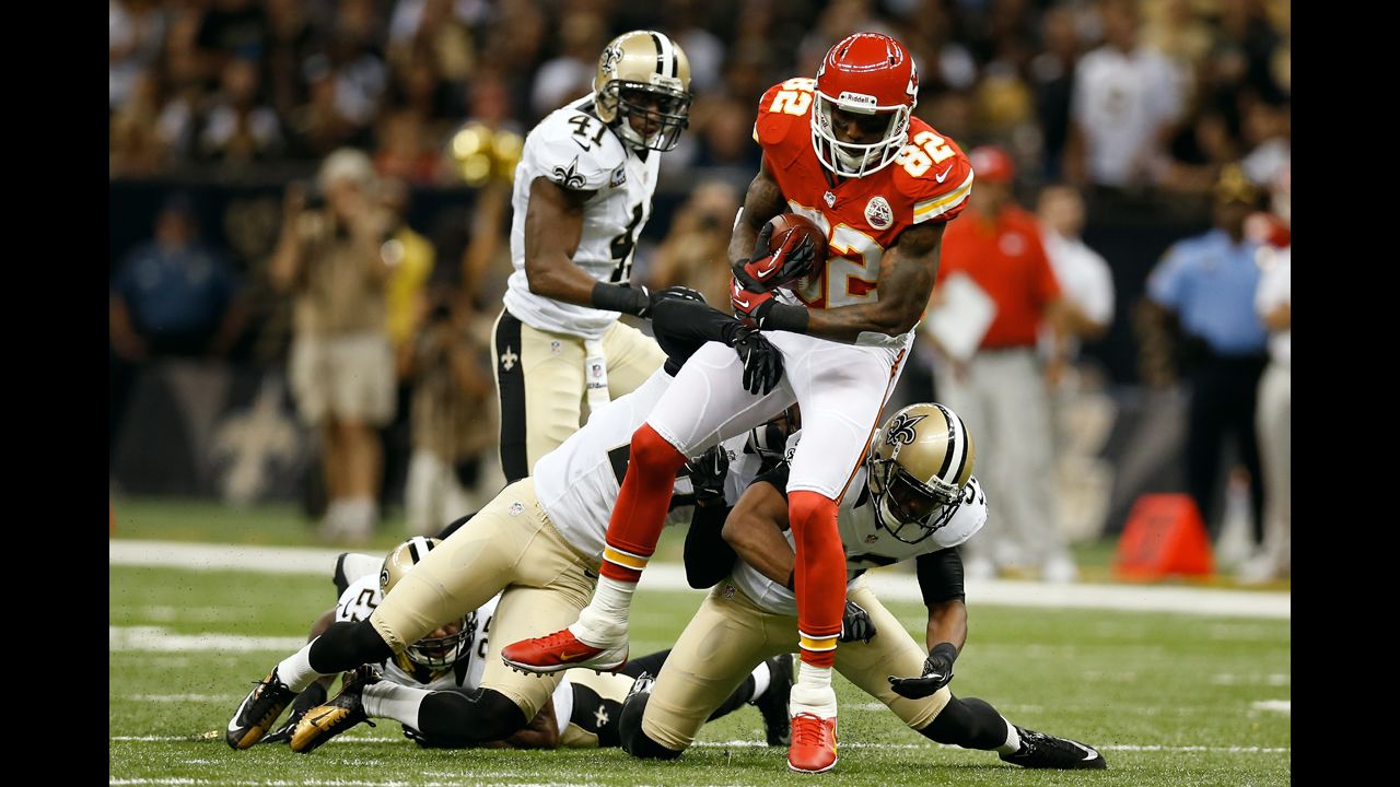 Dwayne Bowe of the Kansas City Chiefs is tackled during Sunday's game against the Saints in New Orleans.