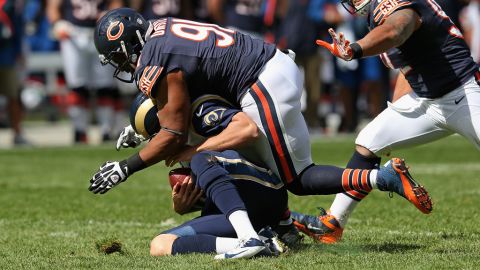 Amobi Okoye of the Chicago Bears sacks Sam Bradford of the St. Louis Rams at Soldier Field in Chicago.