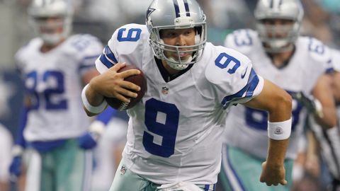 Cowboys quarterback Tony Romo runs for daylight against Tampa Bay.