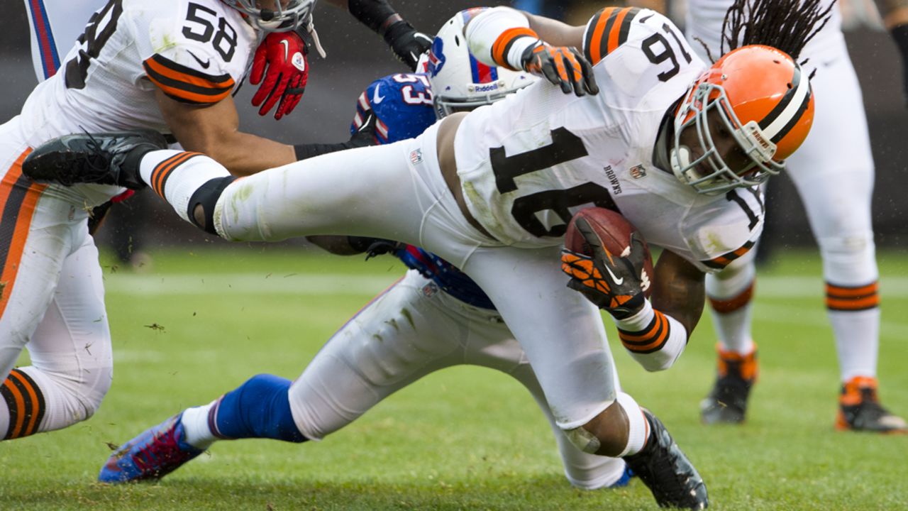 Josh Cribbs of the Cleveland Browns is tackled by Nigel Bradham of the Buffalo Bills on Sunday.