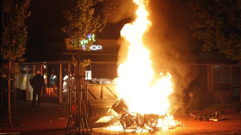 Chairs burn in the Dutch town of Haren late on September 21, 2012 after a teenager's birthday invite on Facebook went viral.