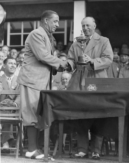 The great Walter Hagen is handed the trophy after a convincing victory for the Americans in the 1937 match at Southport -- the first time an away team had claimed the trophy. 
