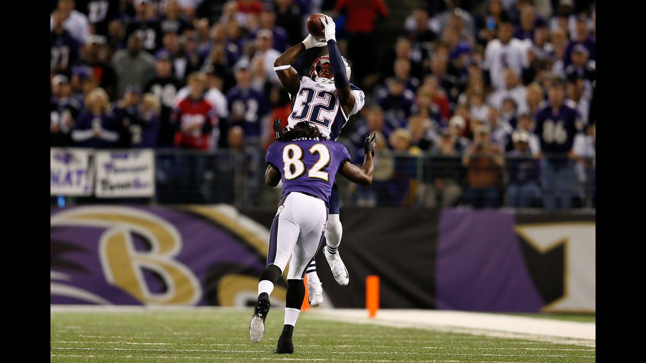 Devin McCourty of the Patriots breaks up a pass intended for the Torrey Smith of the Ravens.