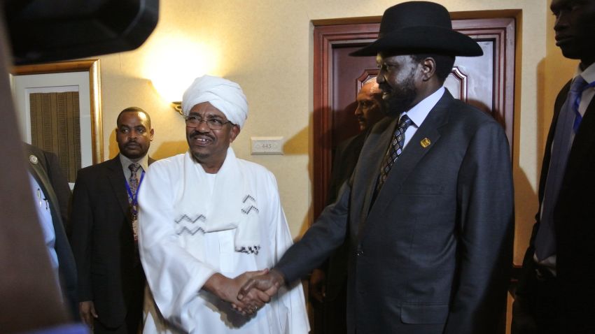 The two leaders shakes hands following a meeting in the Ethiopian capital Addis Ababa, on July 14, 2012.