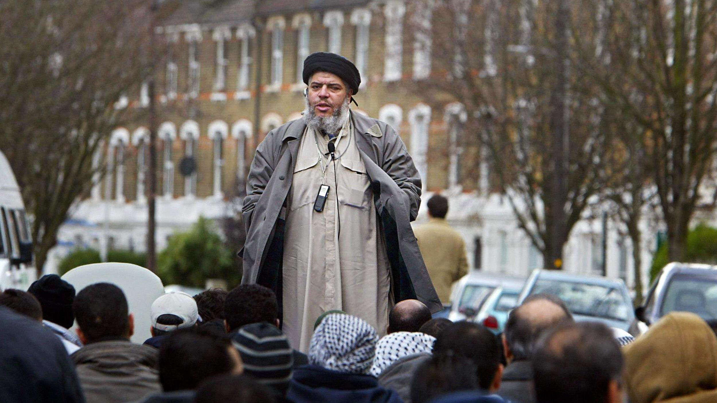 Abu Hamza al-Masri addresses followers near Finsbury Park mosque in London in 2004.