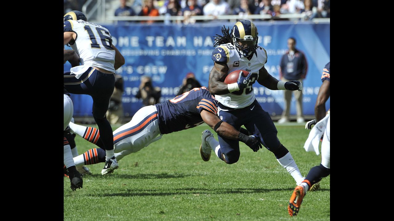 Lance Briggs of the Chicago Bears tackles Steven Jackson of the St. Louis Rams on Sunday at Soldier Field in Chicago.