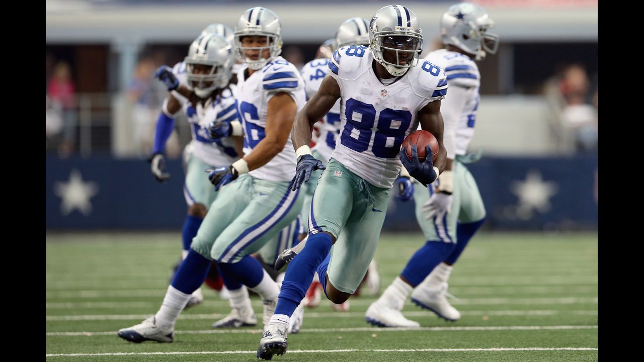Dez Bryant of the Cowboys makes a 44-yard punt return Sunday against the Buccaneers.