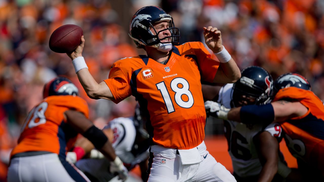 Denver quarterback Peyton Manning throws a pass in the first quarter against the Texans.