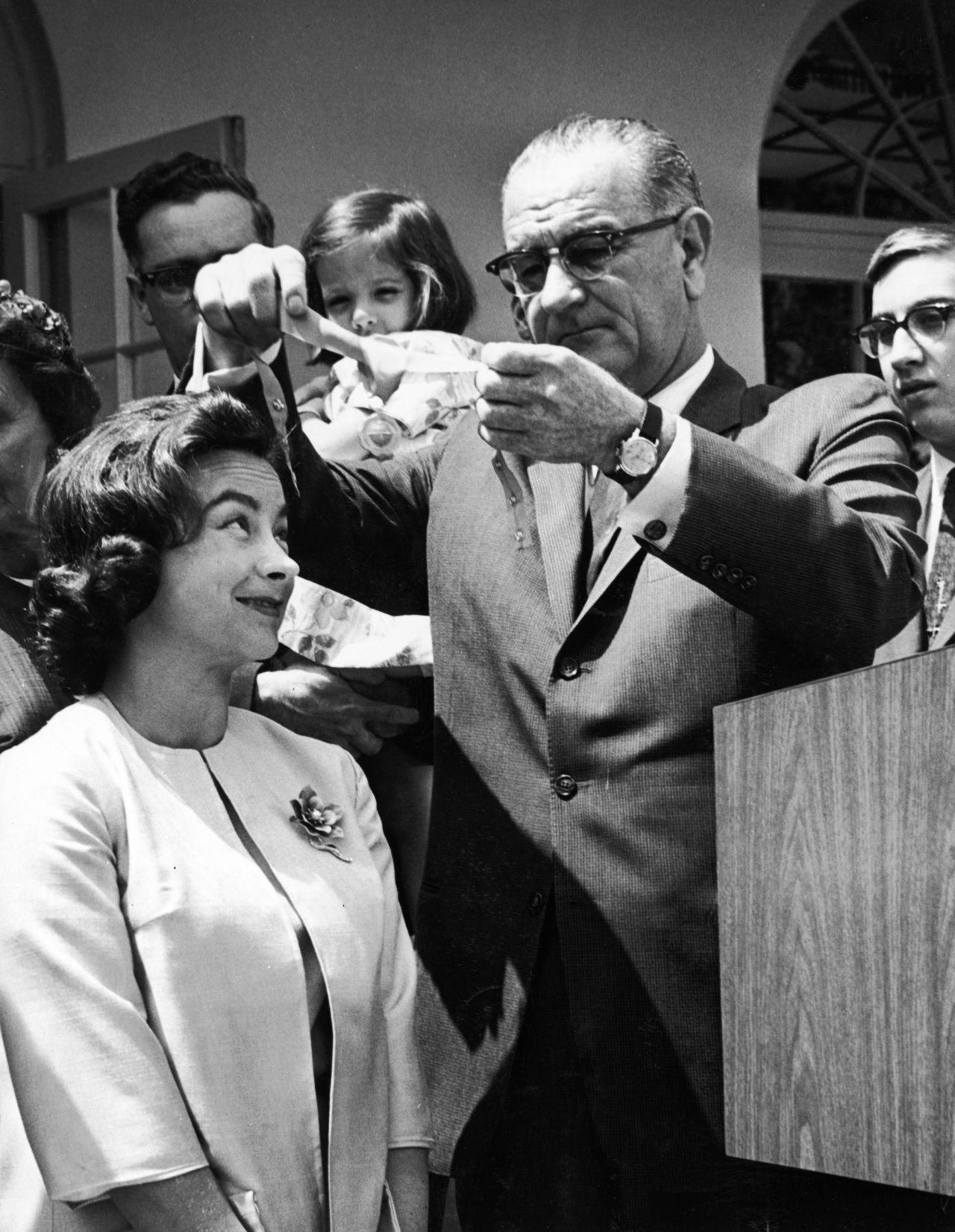 American Jerrie Mock receives an award from President Lyndon B. Johnson in 1964 after becoming the first female to fly solo around the world.