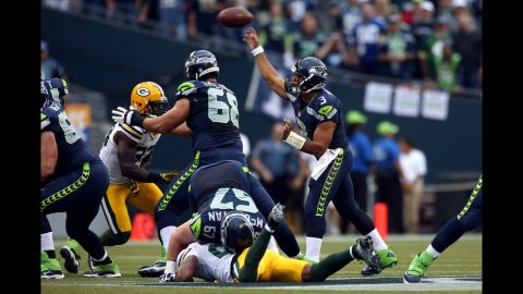 Seattle's Russell Wilson throws the ball in Monday night's game against Green Bay.