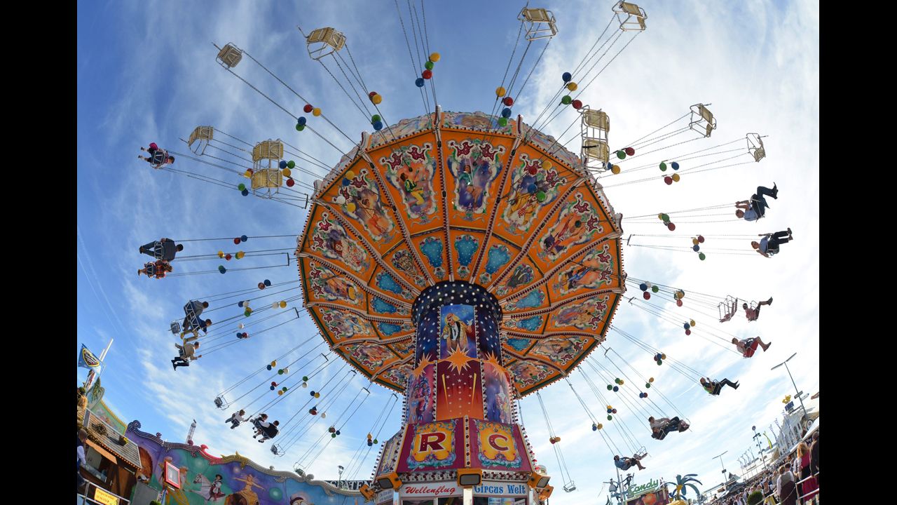 A colorful swing ride turns on Tuesday, the fourth day of the festival.