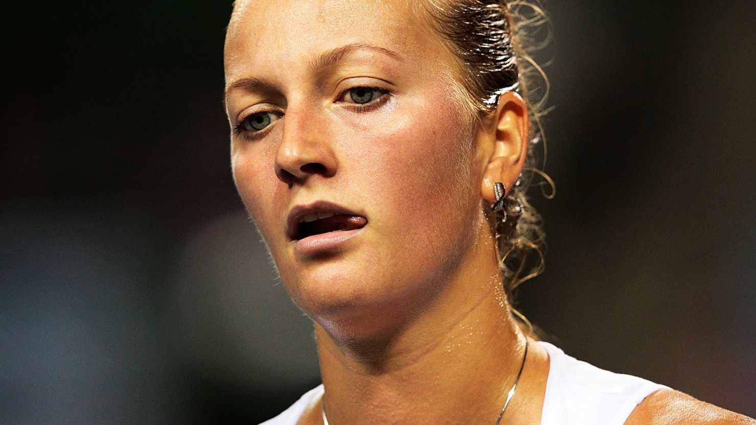 A dejected Petra Kvitova slides to defeat against unseeded Croatian Petra Martic in Tokyo.