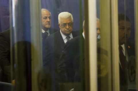 Palestinian Authority President Mahmoud Abbas, center, arrives at the United Nations on Tuesday.