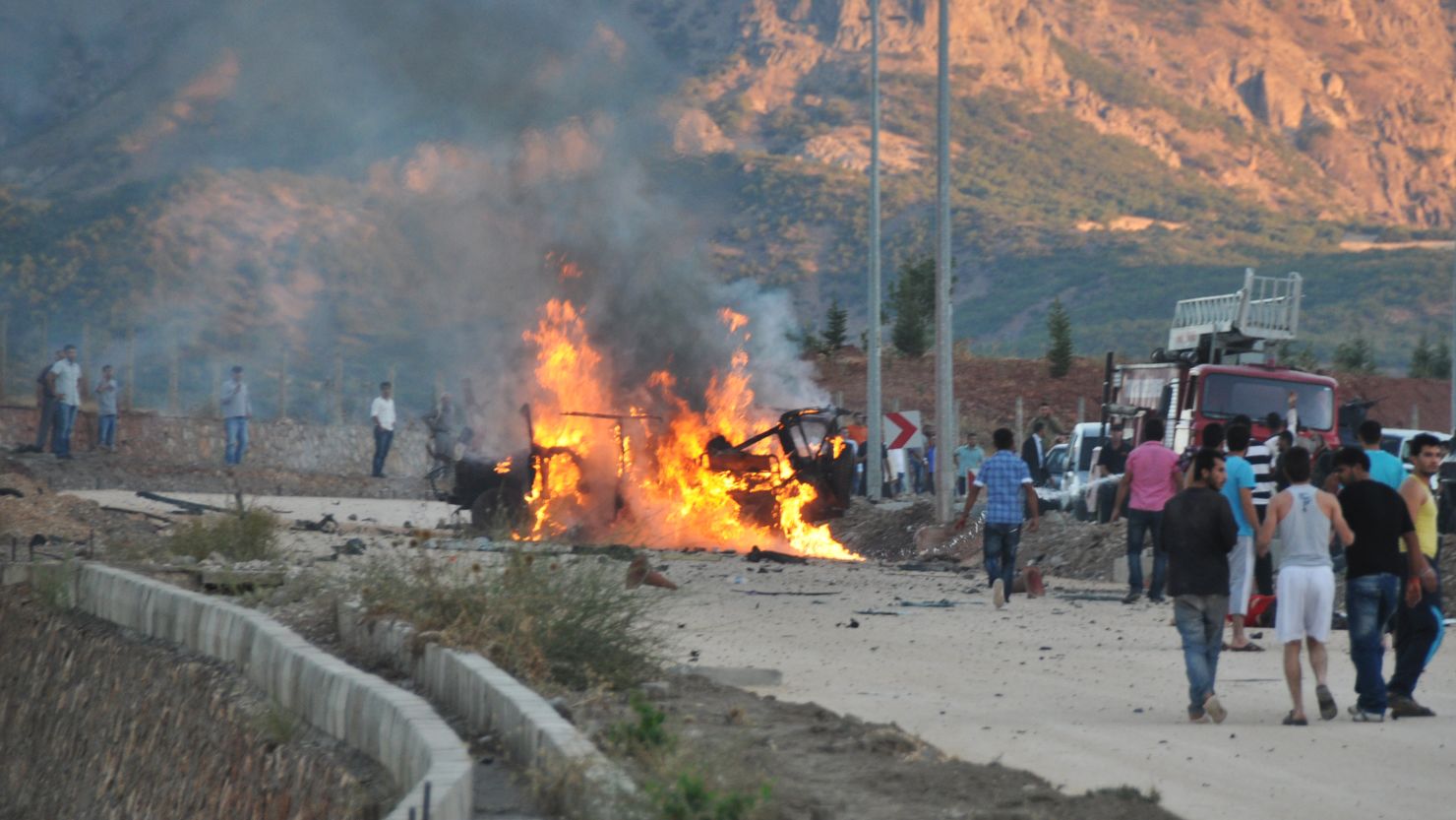A vehicle burns after an explosion in the center of Tunceli on September 25, 2012. 
