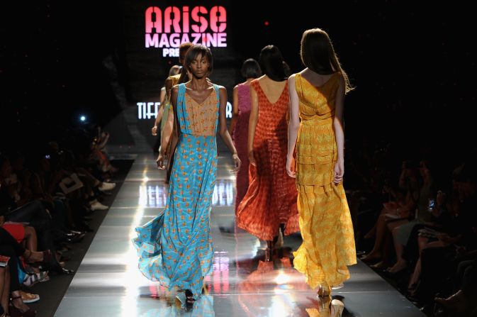 Folake Folarin-Coker's creations for Tiffany Amber "offered up floaty resort-wear with decadent 1970s overtones," according to Jennings. "Entitled The Rhythms Of Africa, jewel-coloured silks were hand printed with drum motifs and formed waist-cinching maxi dresses, jumpsuits and rompers." 