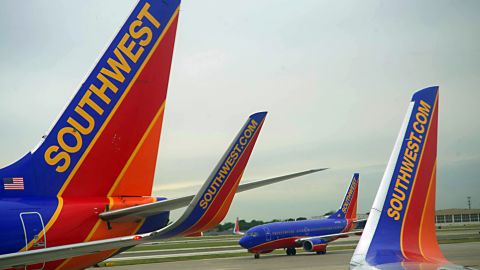 A woman is suing Southwest Airlines and a flight attendant for $800,000 for serving tea she says severely burned her.
