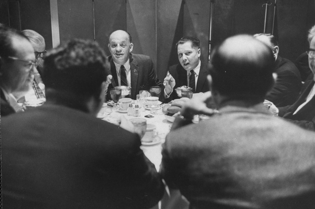 Hoffa eats with union leader Joseph Curran, left, in 1959.