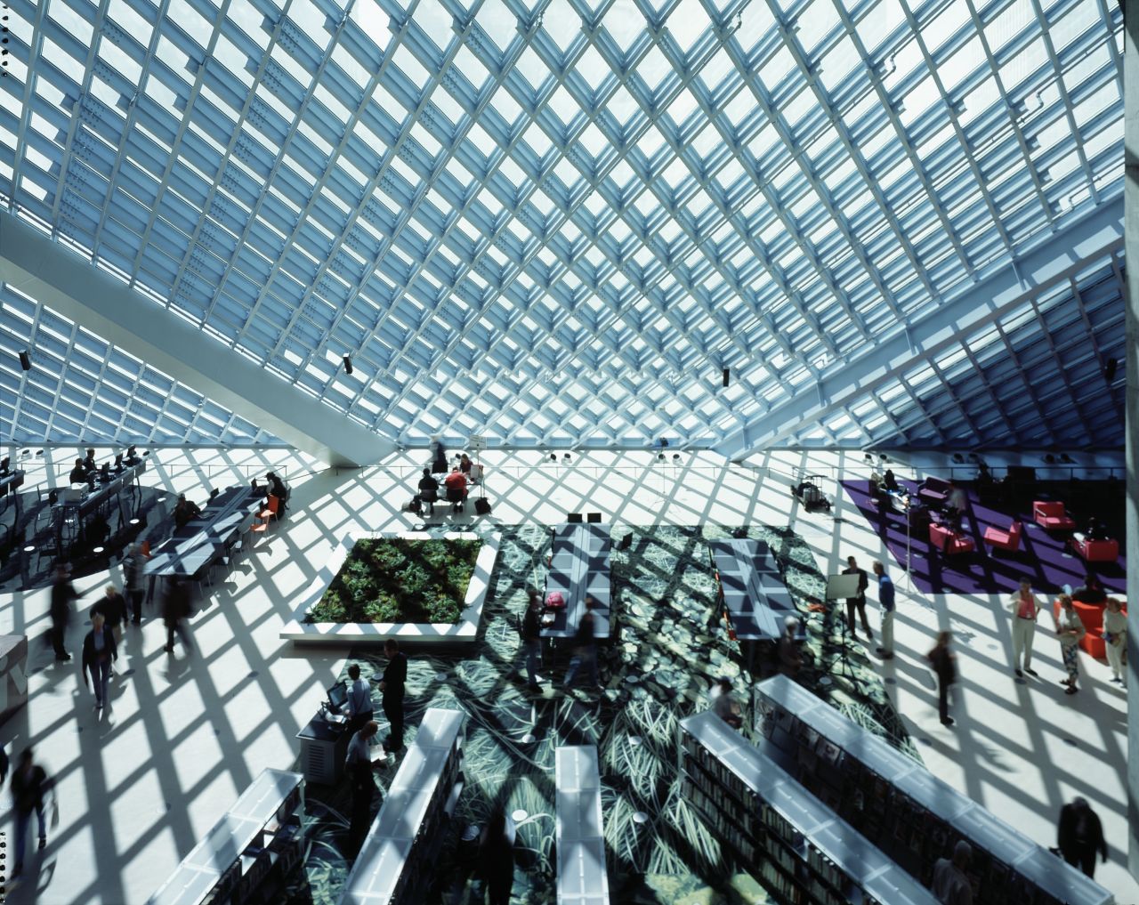 Its layers of glass encased in steel lattices let in abundant light.