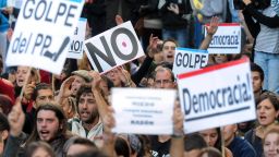 Protesters take part in a demonstration organized by Spain's "indignant" protesters on September 26 in Madrid.