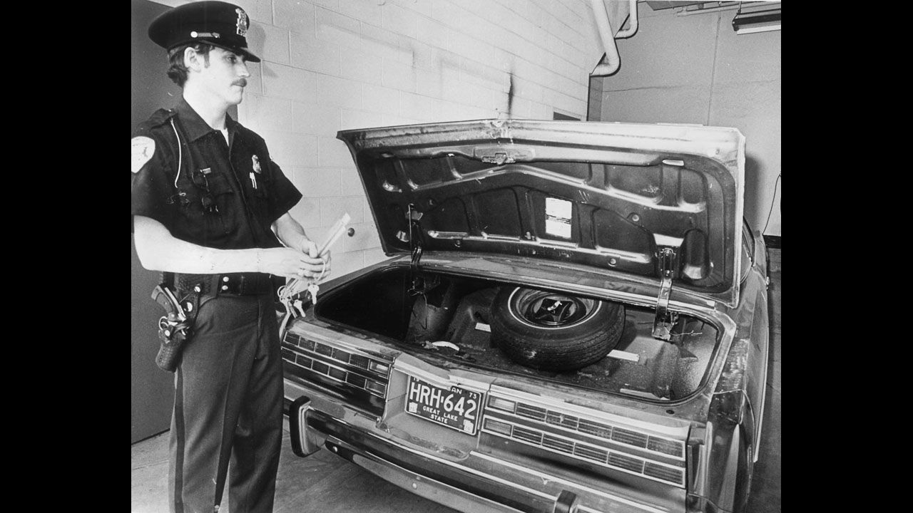 A Bloomfield Township, Michigan, police officer stands beside Hoffa's car after the former labor leader's disappearance in July 1975. Hoffa was last seen at a restaurant in suburban Detroit on July 30, 1975.