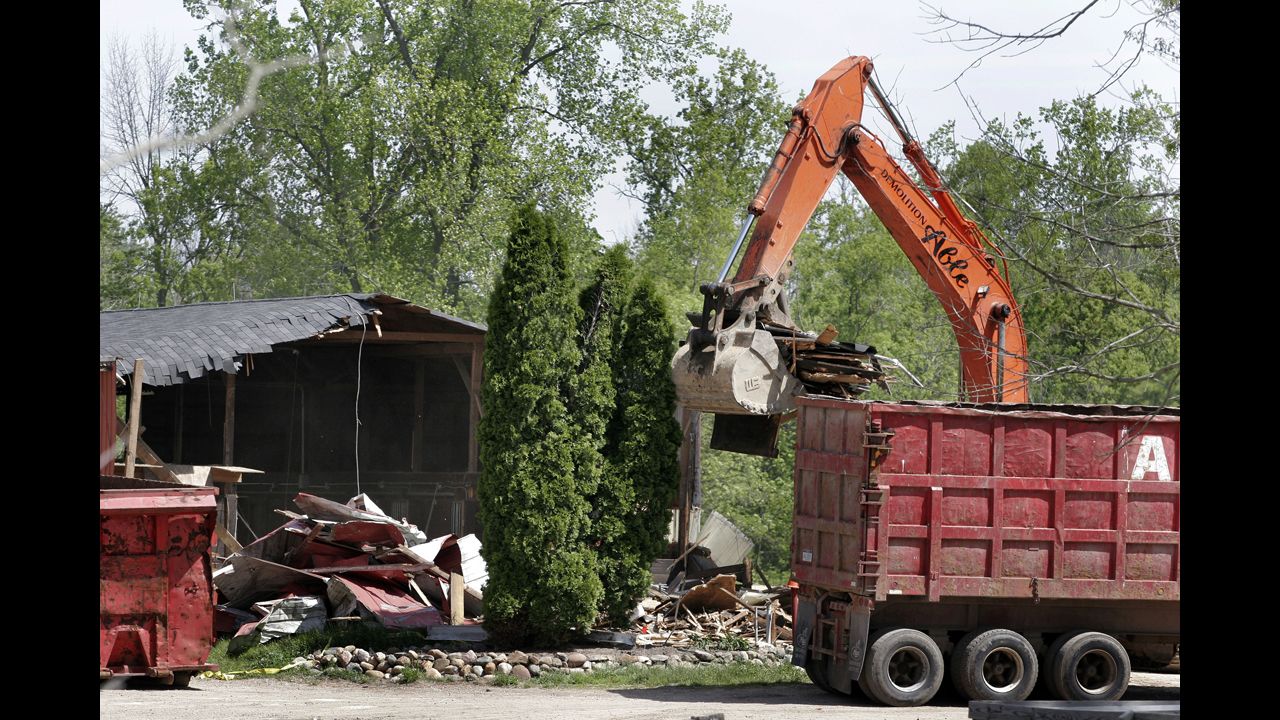 Demolition workers tear down a horse barn for the FBI in 2006 in a search for Hoffa's remains in Milford, Michigan. <a href="http://www.cnn.com/2006/US/05/17/hoffa.search/index.html">The FBI had received a tip</a> that Hoffa was buried on the farm.
