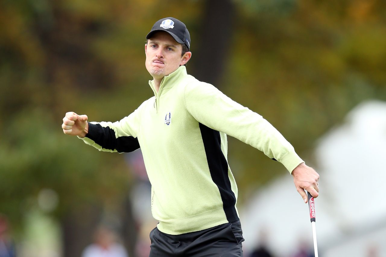 Justin Rose of Europe celebrates on the fourth hole after a long putt at the 39th Ryder Cup Friday at Medinah Country Club in Medinah, Illinois.