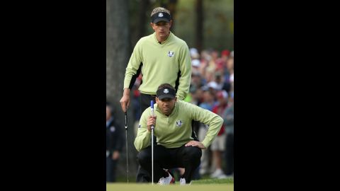 Luke Donald and Sergio Garcia of Europe line up a putt on the seventh hole on Friday.
