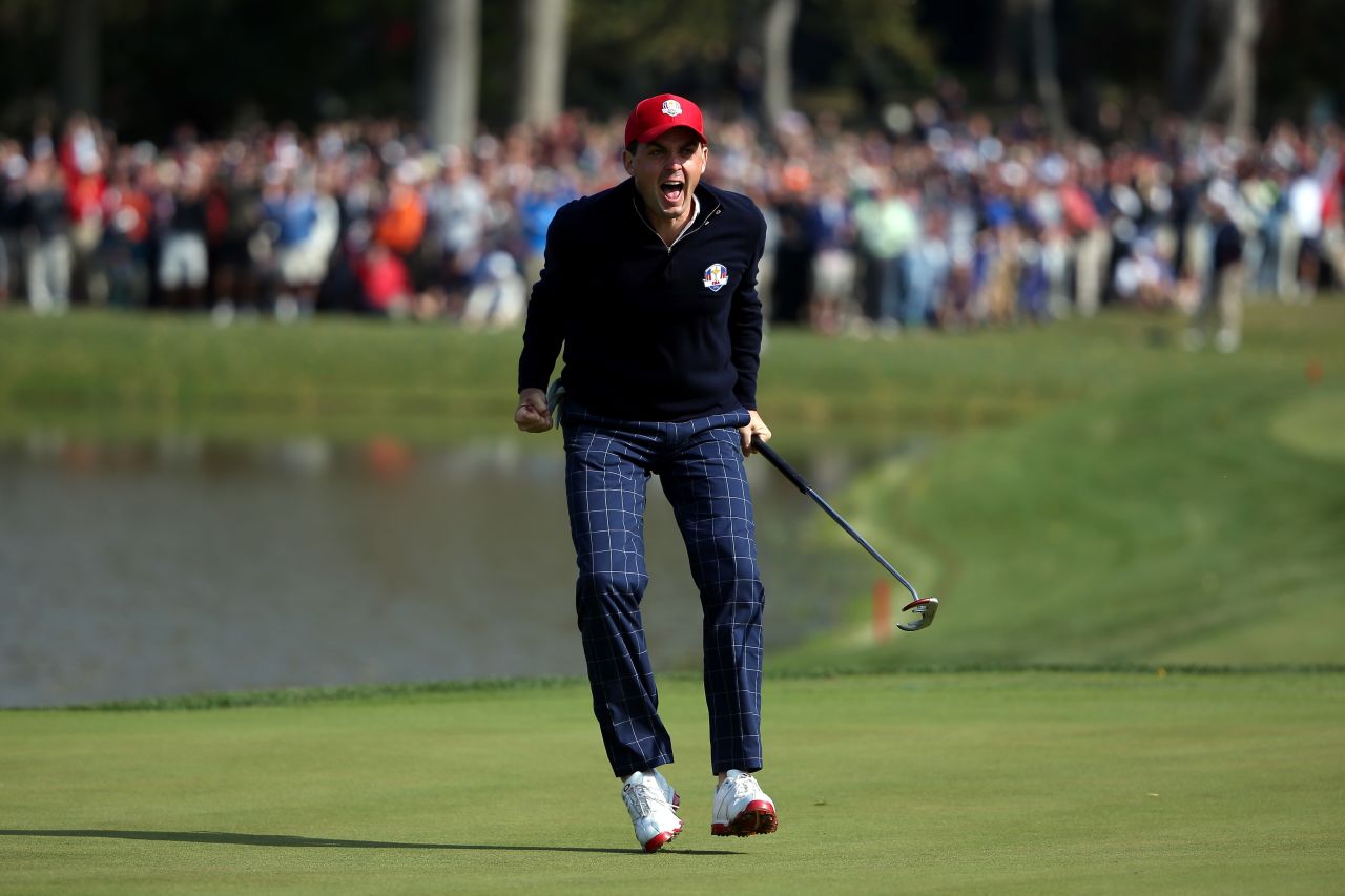 Keegan Bradley celebrates on the 15th green after he made birdie to defeat the team of Donald and Garcia during the Morning Foursome matches on Friday.